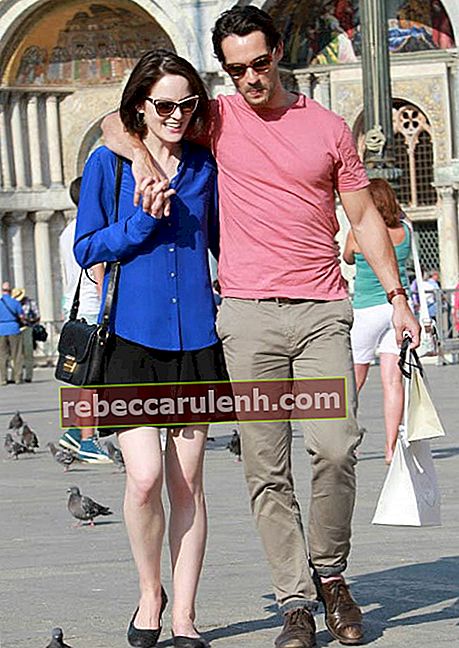 Мишел Докери и Джон Дайнън по време на разглеждане на забележителности във Венеция през август 2013 г.