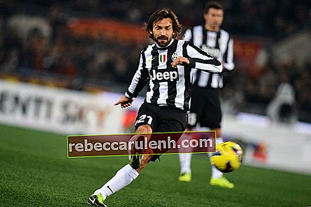 Andrea Pirlo takes a free kick in an away match against AS Roma at Stadio Olympico in February 2013