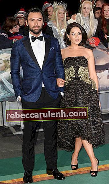 Ейдън Търнър и Сара Грийн на световната премиера на "Хобит: Битката на петте армии" през декември 2014 г.